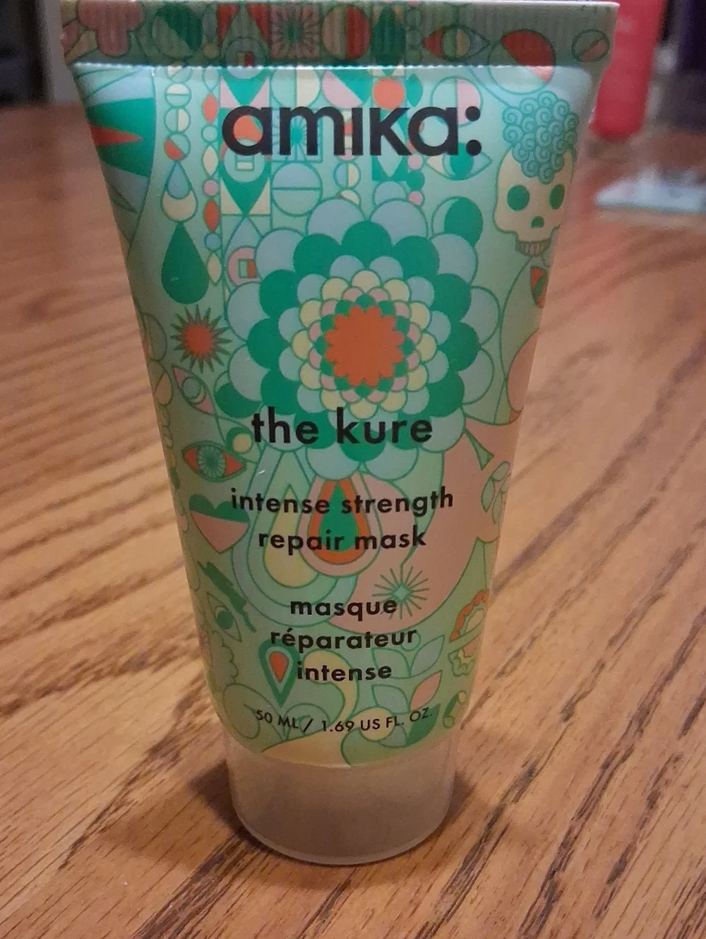 amika The Kure Intense Strength Repair Mask - Green with Orange Accents